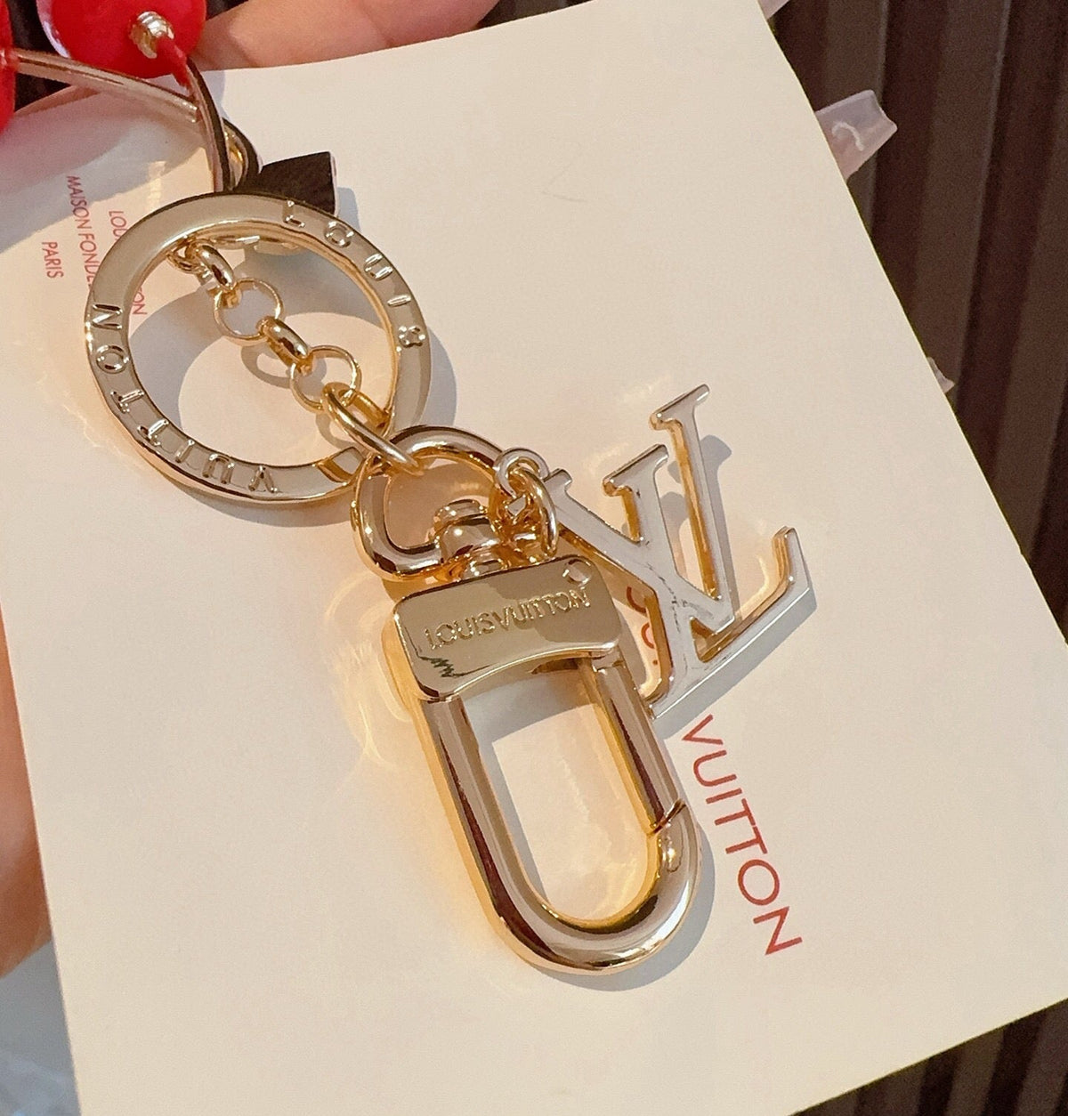 LOUIS VUITTON Metal Logo Bag Charm Keychain