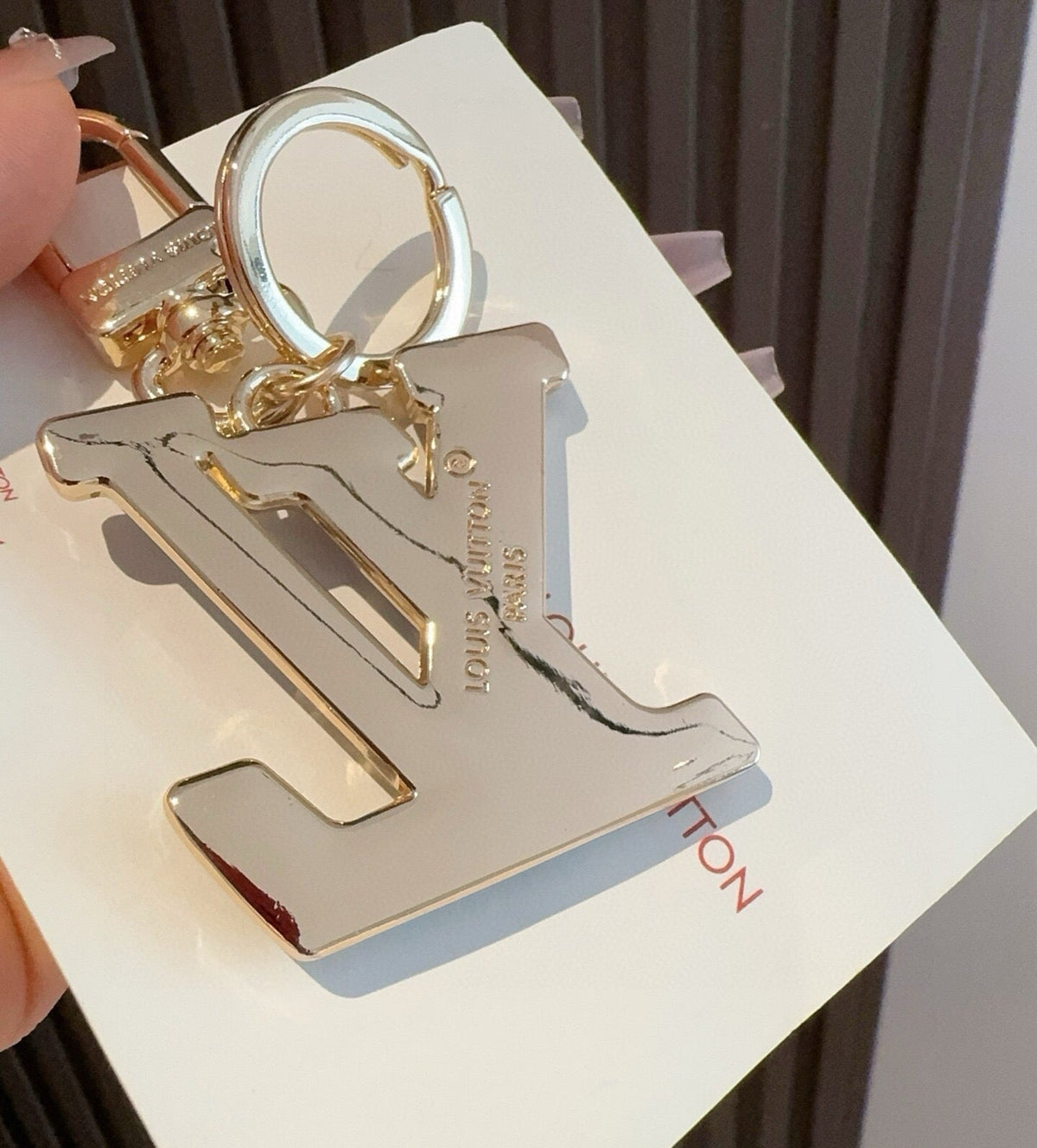 LOUIS VUITTON Metal Logo Bag Charm Keychain
