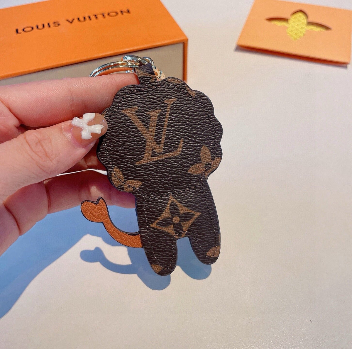 LOUIS VUITTON Metal Logo Bag Charm Keychain