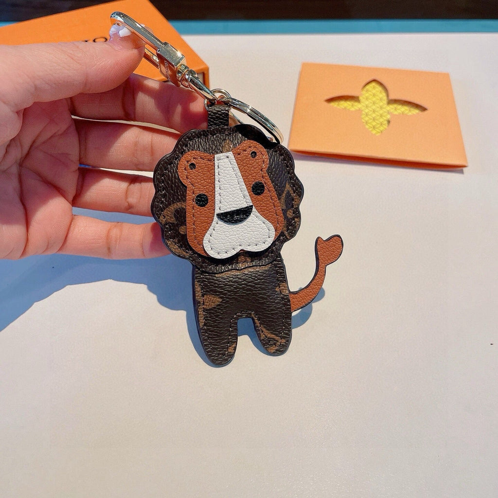 LOUIS VUITTON Metal Logo Bag Charm Keychain
