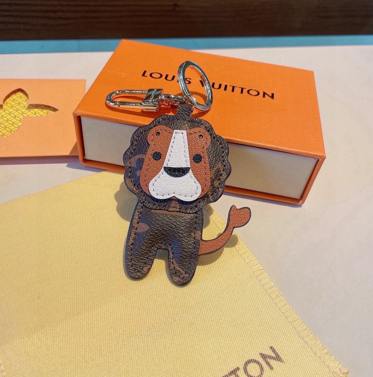LOUIS VUITTON Metal Logo Bag Charm Keychain