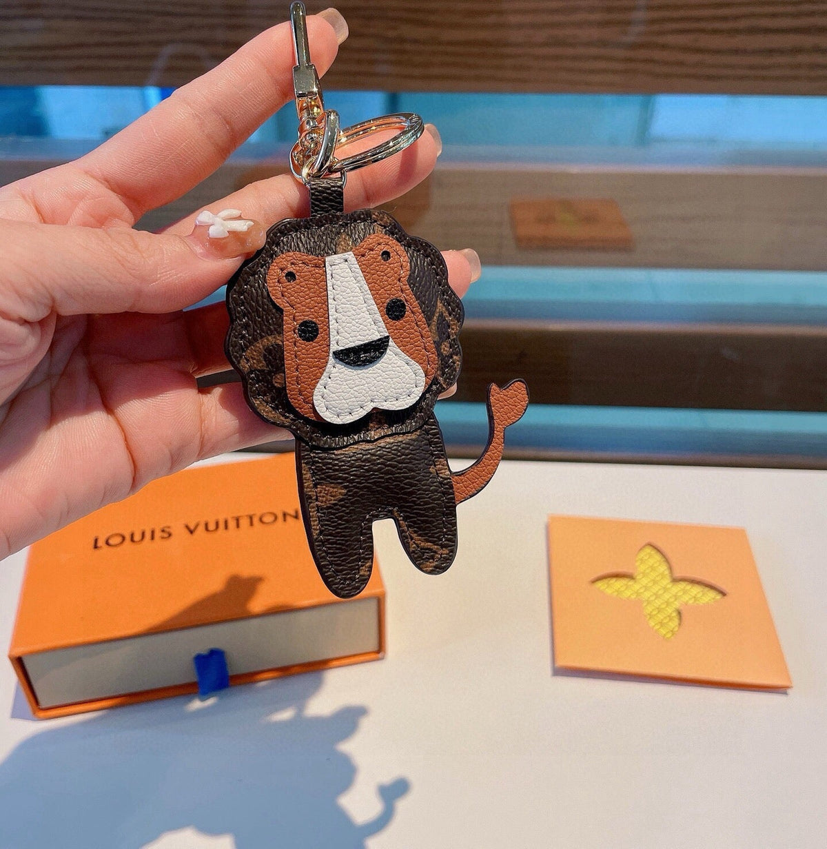 LOUIS VUITTON Metal Logo Bag Charm Keychain