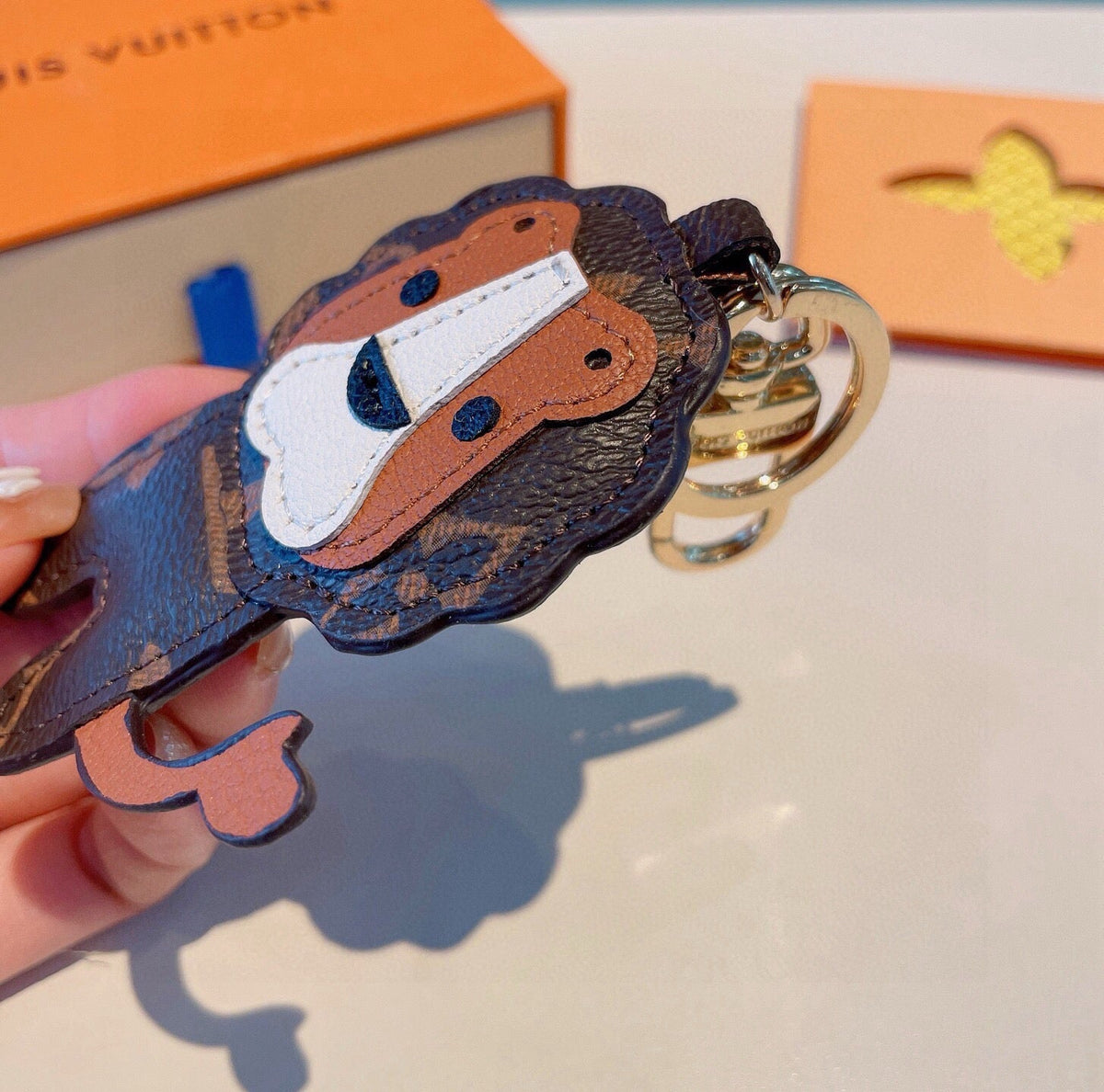 LOUIS VUITTON Metal Logo Bag Charm Keychain