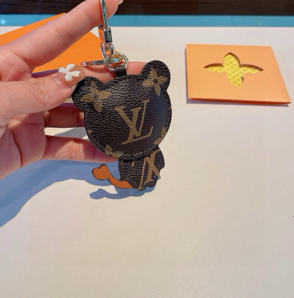 LOUIS VUITTON Metal Logo Bag Charm Keychain