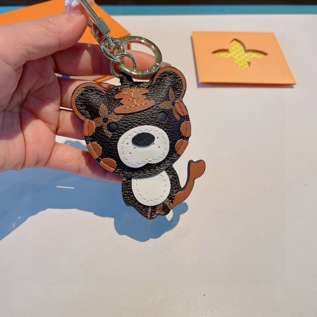 LOUIS VUITTON Metal Logo Bag Charm Keychain