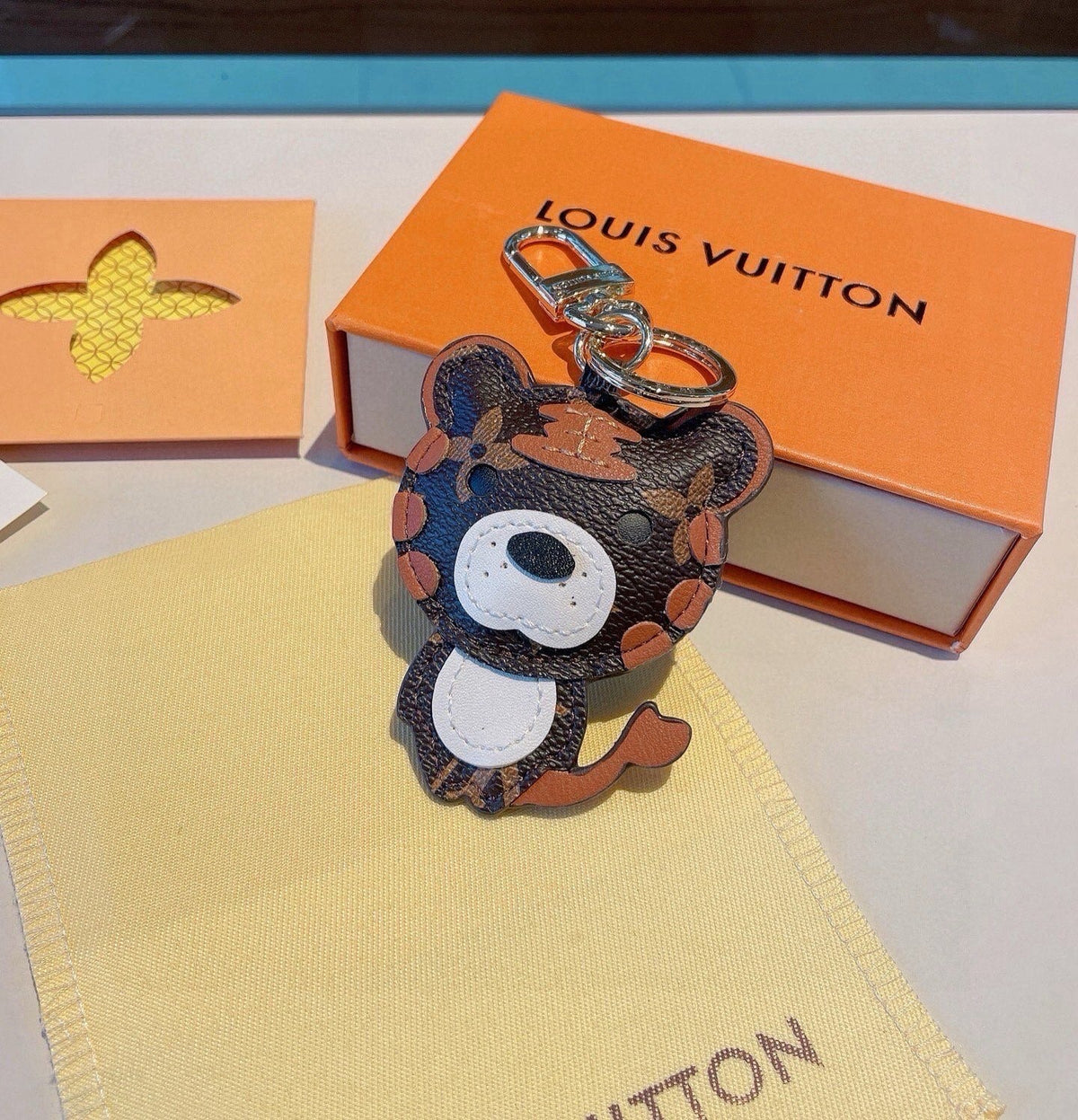 LOUIS VUITTON Metal Logo Bag Charm Keychain