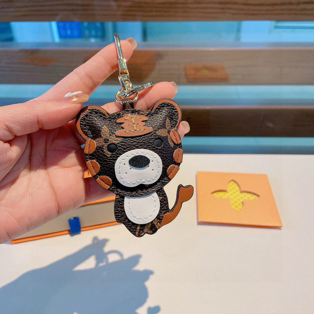 LOUIS VUITTON Metal Logo Bag Charm Keychain
