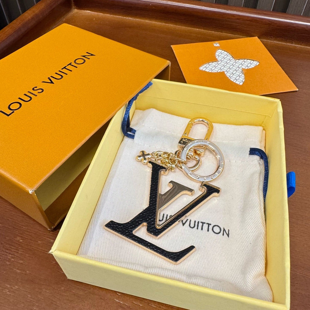LOUIS VUITTON Brass Flower Bag Charm Keychain