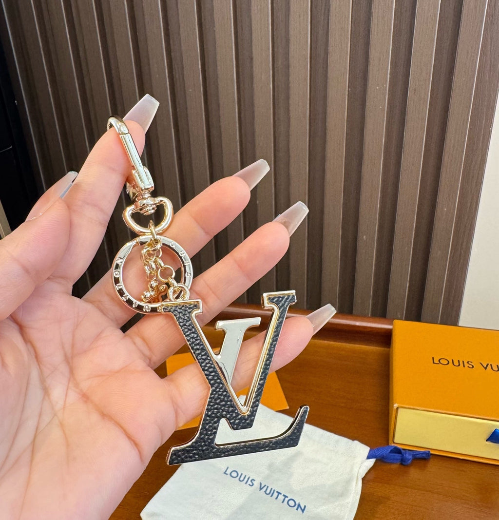 LOUIS VUITTON Brass Flower Bag Charm Keychain