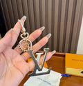 LOUIS VUITTON Brass Flower Bag Charm Keychain
