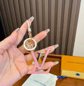 LOUIS VUITTON Brass Flower Bag Charm Keychain