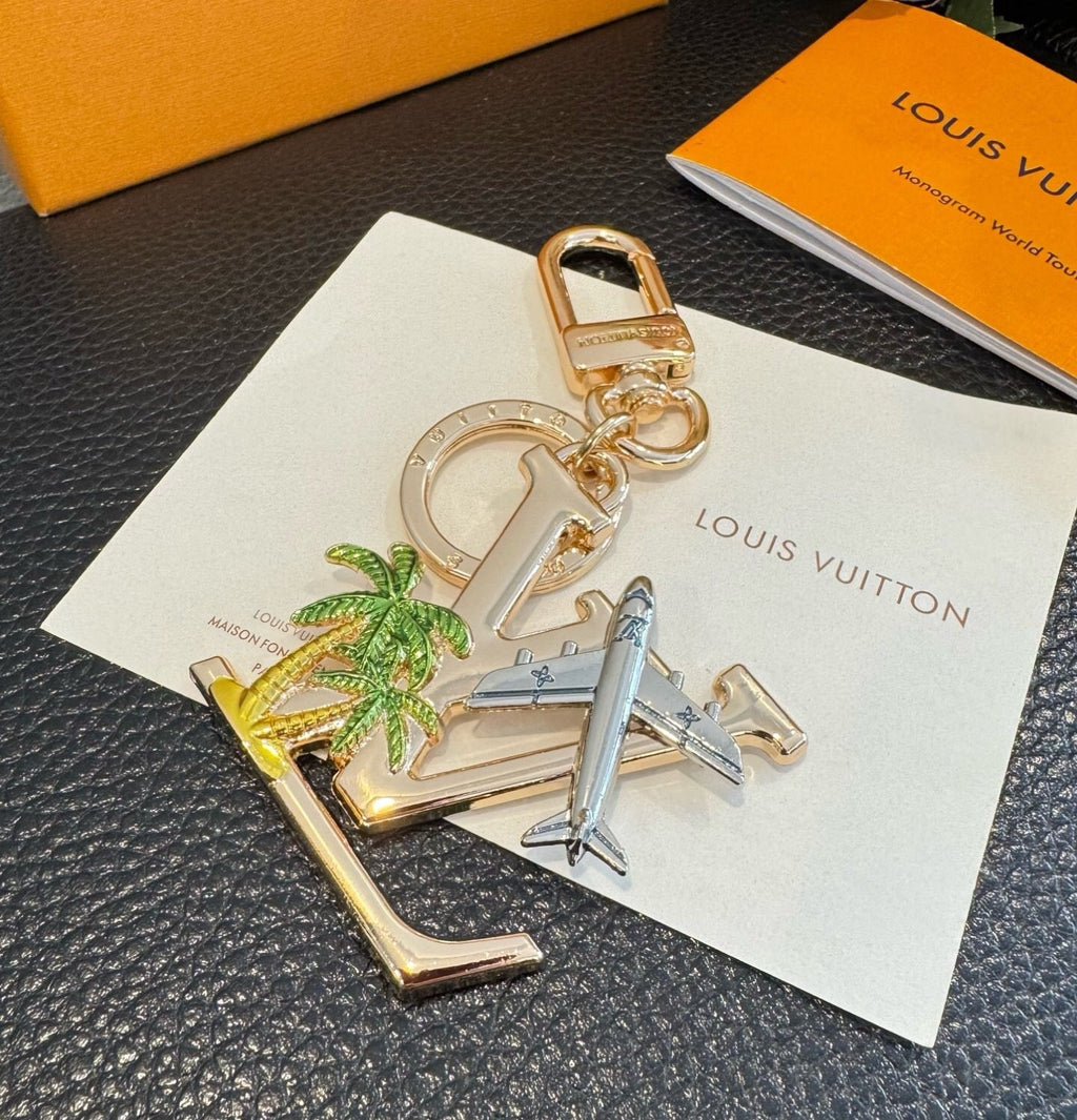LOUIS VUITTON Metal Logo Bag Charm Keychain