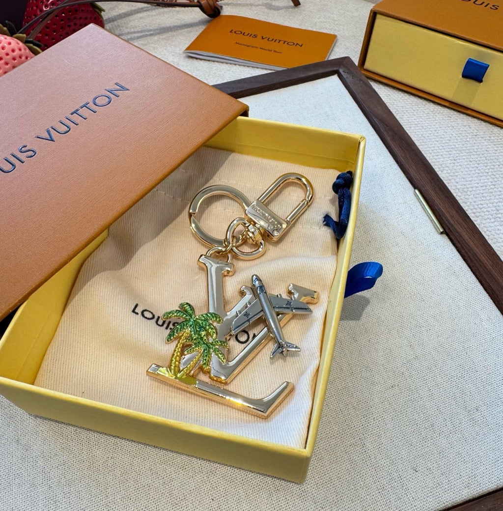 LOUIS VUITTON Metal Logo Bag Charm Keychain