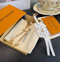 LOUIS VUITTON Logo Bag Charm Keychain